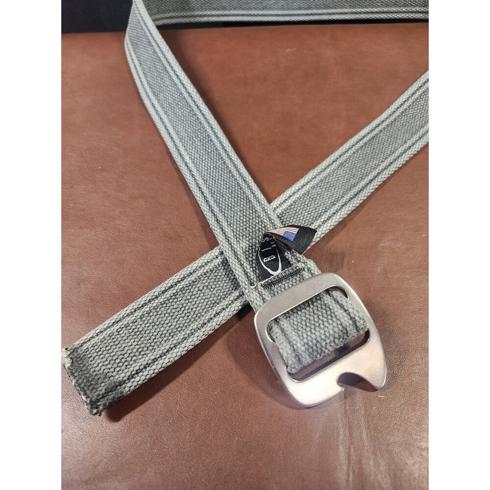 gray Bison Designs web belt featuring an integrated bottle opener buckle.